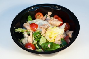 Tuna salad with tuna, spinach, cherry tomatoes, iceberg lettuce and mayonnaise sauce